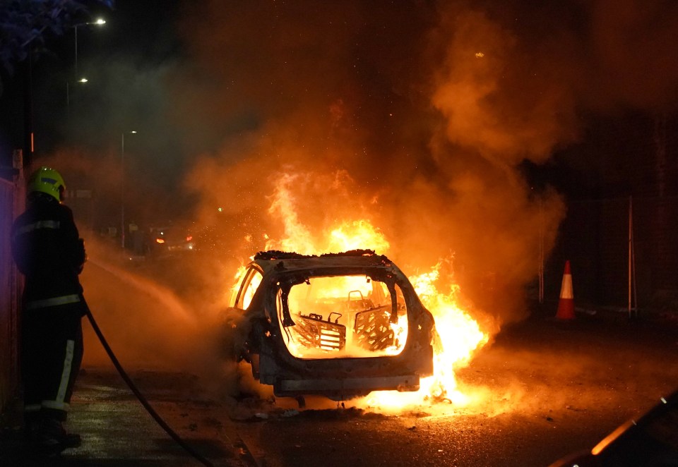 A cop car was set alight amid riots in Hartlepool last night