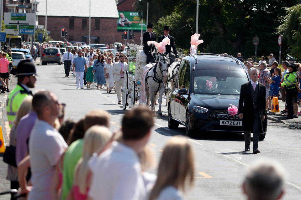 Mourners have gathered to pay their respects