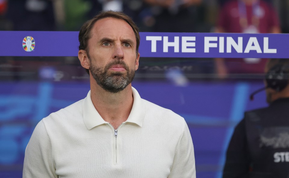 a man stands in front of a sign that says the final