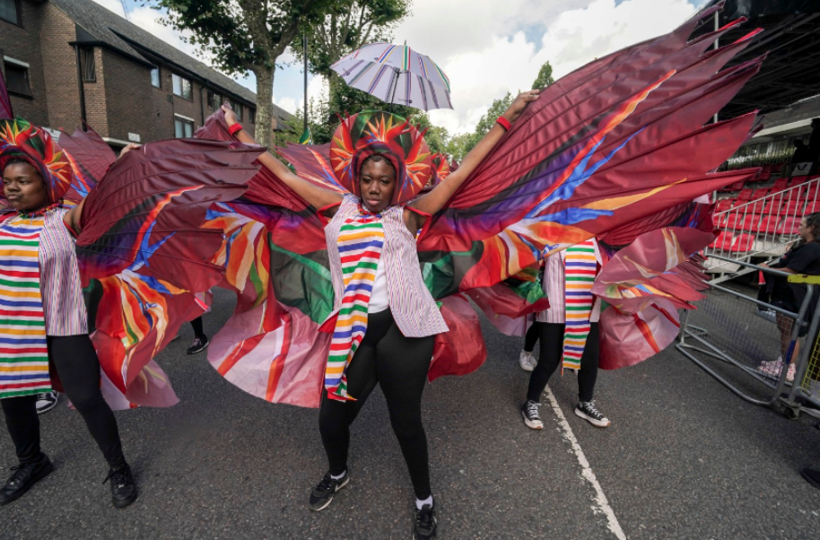 Participants taking part in the Children's Day Parade, part of the Notting Hill Carnival celebration in west London over the Summer Bank Holiday weekend