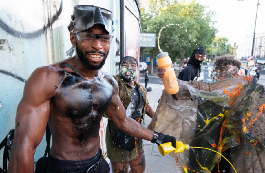 Revellers make a splash at the Notting Hill Carnival in west London