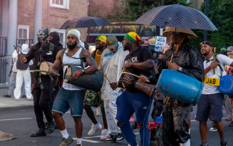 Revellers out for the Notting Hill Carnival today