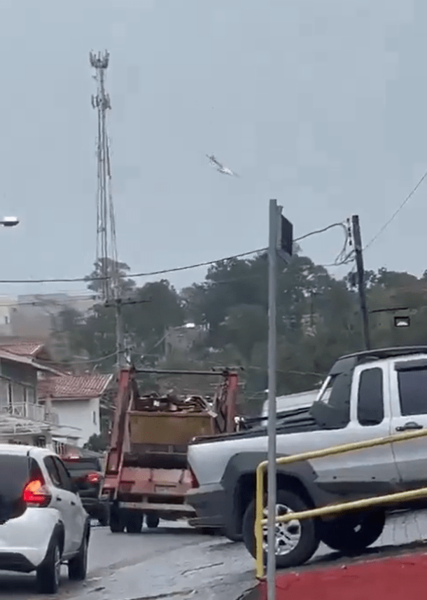 a white truck is parked on the side of the road