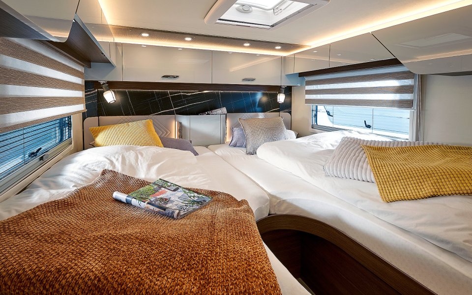 The motorhome comes with a huge bed for Adam to relax in