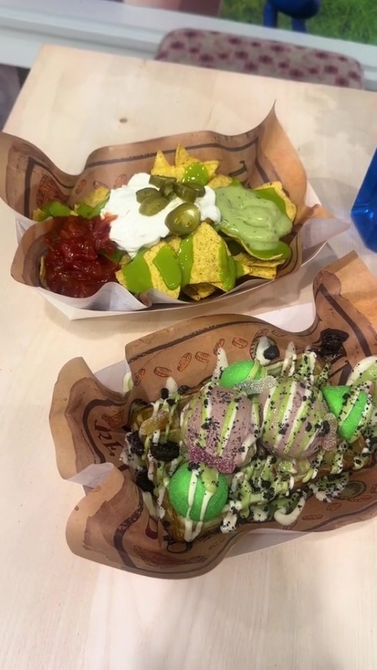 two trays of food on a table with one that says ' ice cream ' on it