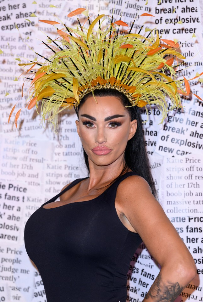 a woman wearing a yellow and orange feathered headpiece