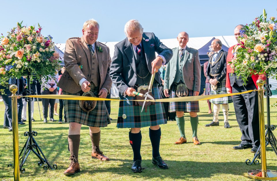 The King sported a tartan kilt and sporran at the annual Summer Flower Show of the Royal Horticultural Society