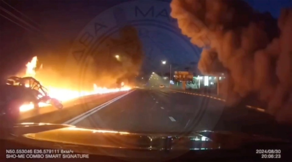 A car was directly hit by a Ukrainian missile in Belgorod as smoke engulfed other drivers along the highway