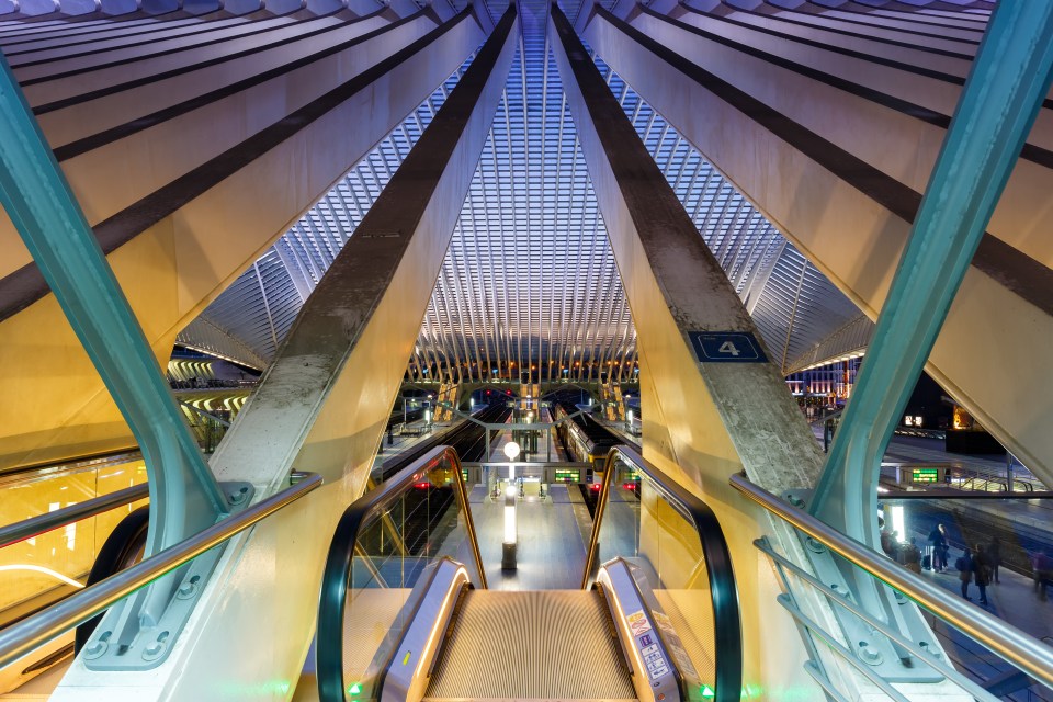 an escalator with a sign that says 4 on it