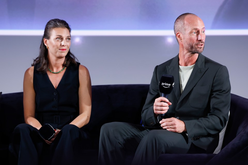 a man and a woman sit on a couch with a microphone that says prime