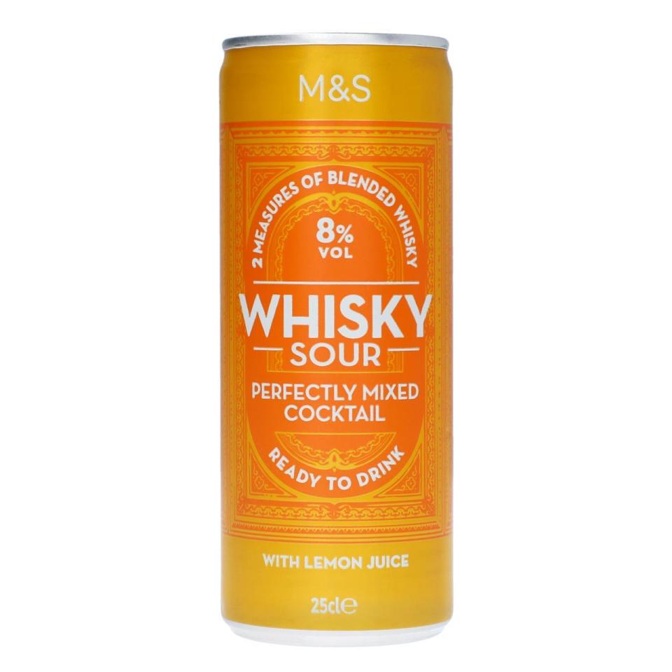 a can of m & s whisky sour cocktail with lemon juice