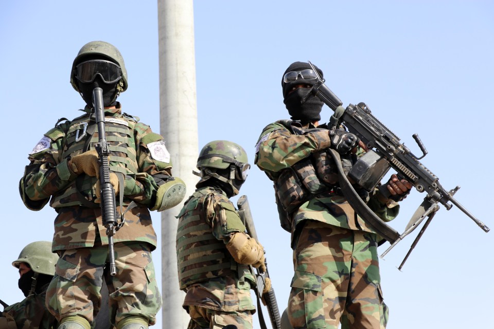 Armed Taliban fighters at the parade on August 14