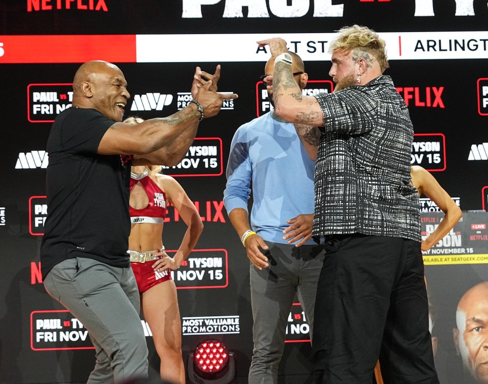 Mike Tyson facing off with Jake Paul