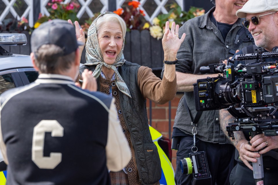 The British acting legend looked jovial as they filmed scenes for the upcoming film adaptation