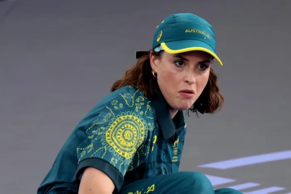 a woman wearing a hat that says australia on it