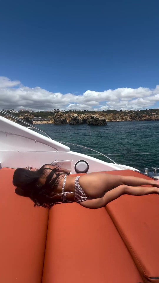 The singer captured herself rolling around on a boat