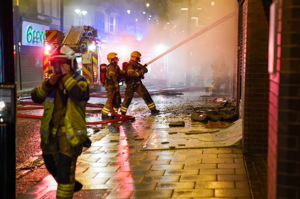 Firefighters battled the blaze surrounded by carnage