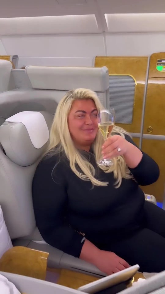 Fans accused her of 'flaunting her wealth' when she was snapped drinking a £200 glass of champagne on a flight