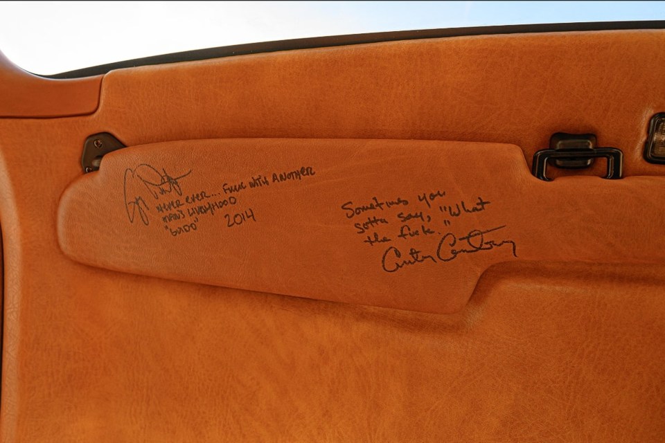 Some interior panels are signed by the cast