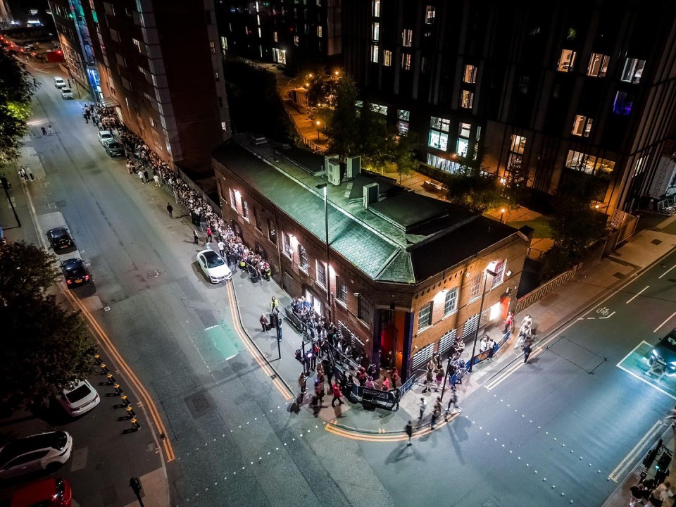 an aerial view of a busy city street at night