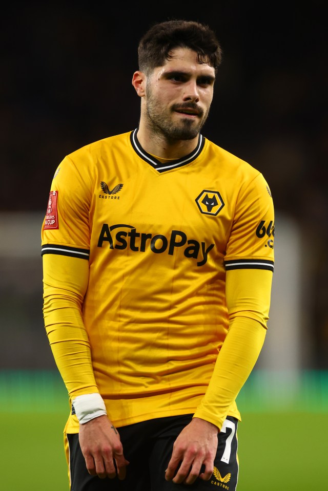 a soccer player wearing a yellow astropay jersey