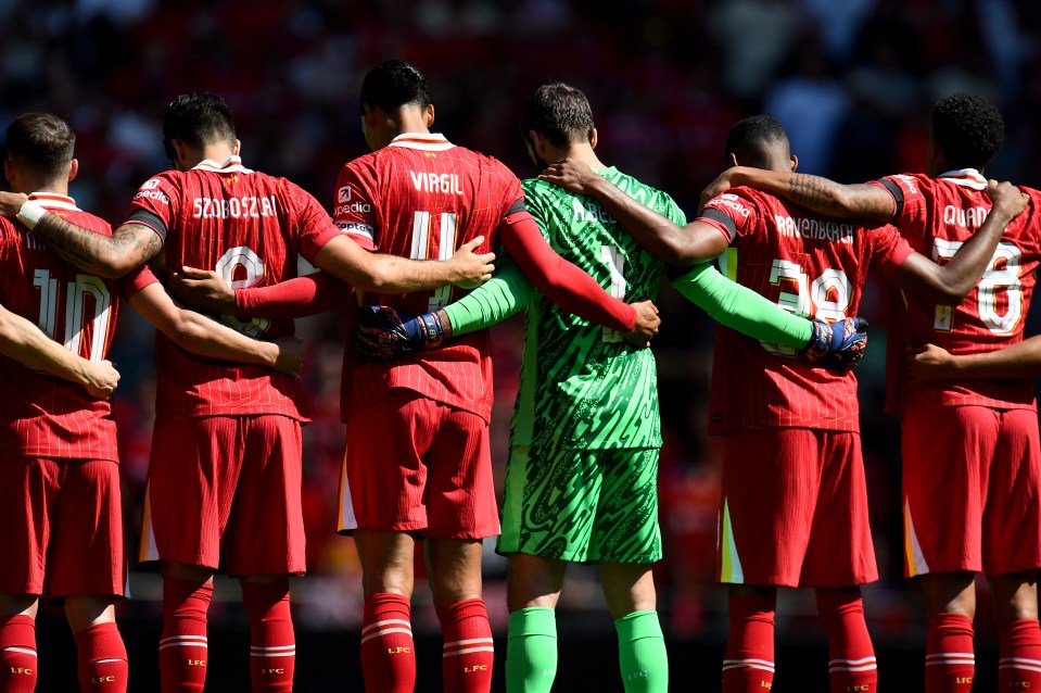 a group of soccer players with one wearing the number 11