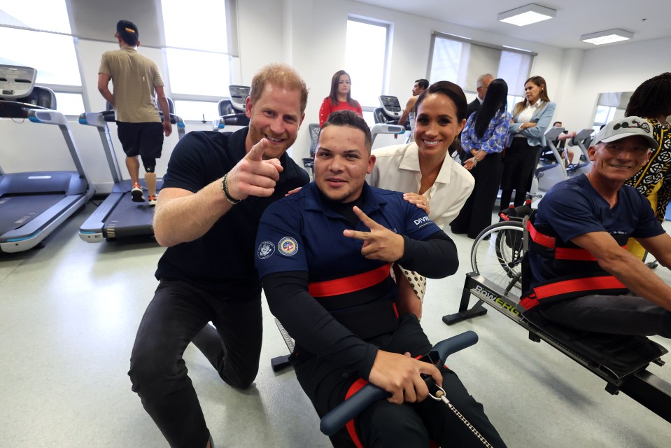 The couple posed for pictures with athletes while they demonstrated their exercise regimens