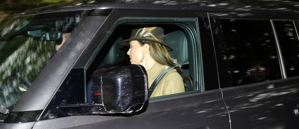 Princess Kate could be spotted sitting next to her husband in the front seat