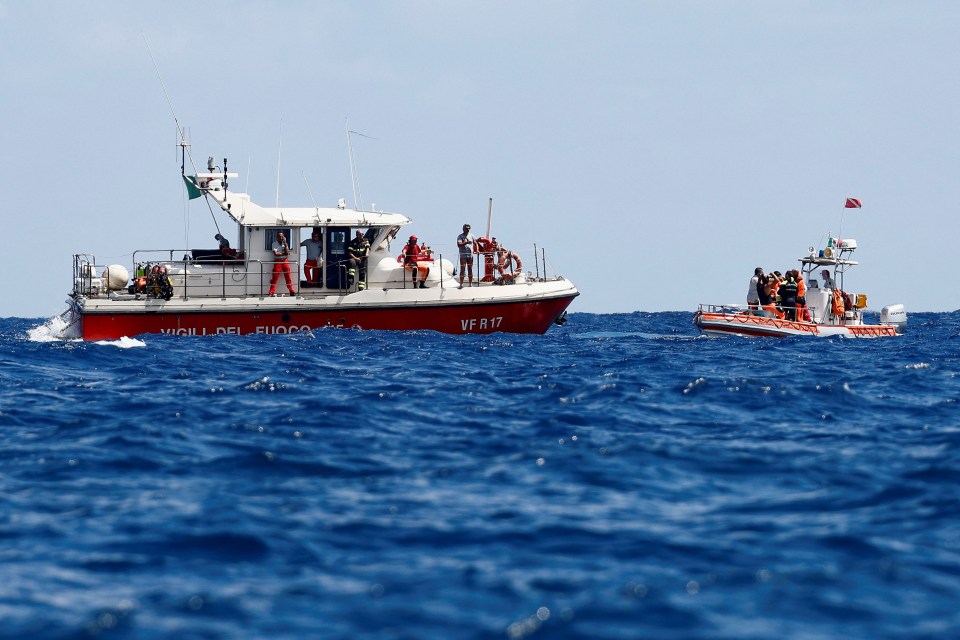 Rescuers at the scene of the wreckage today, hunting for the missing