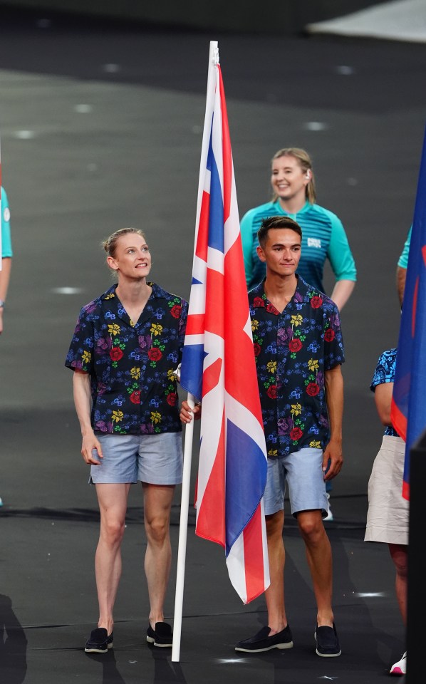 Team GB flagbearers Alex Yee and Bryony Page entered the stage waving the flag