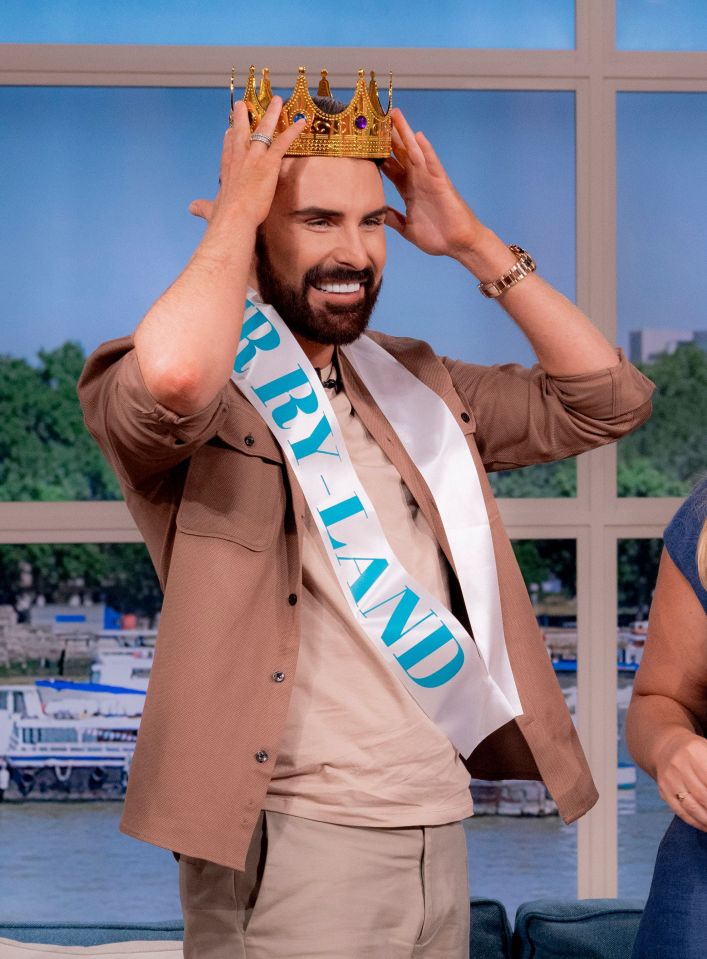 Rylan Clark is presented with a sash and crown