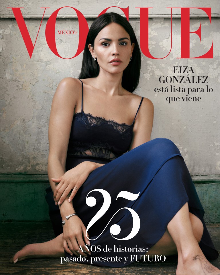 a woman sits on the cover of a magazine called vogue