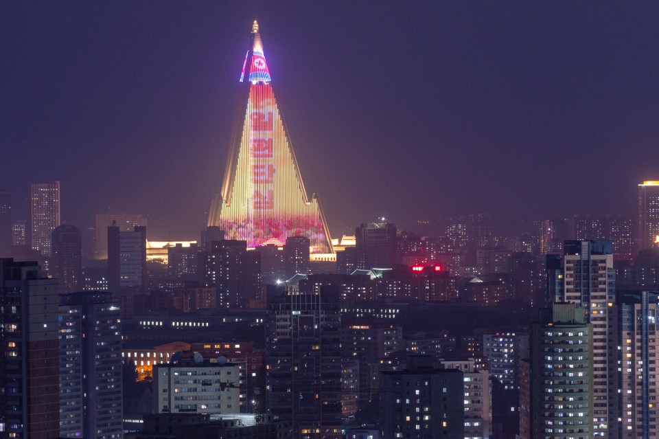 The building is used as giant TV screen for propaganda material