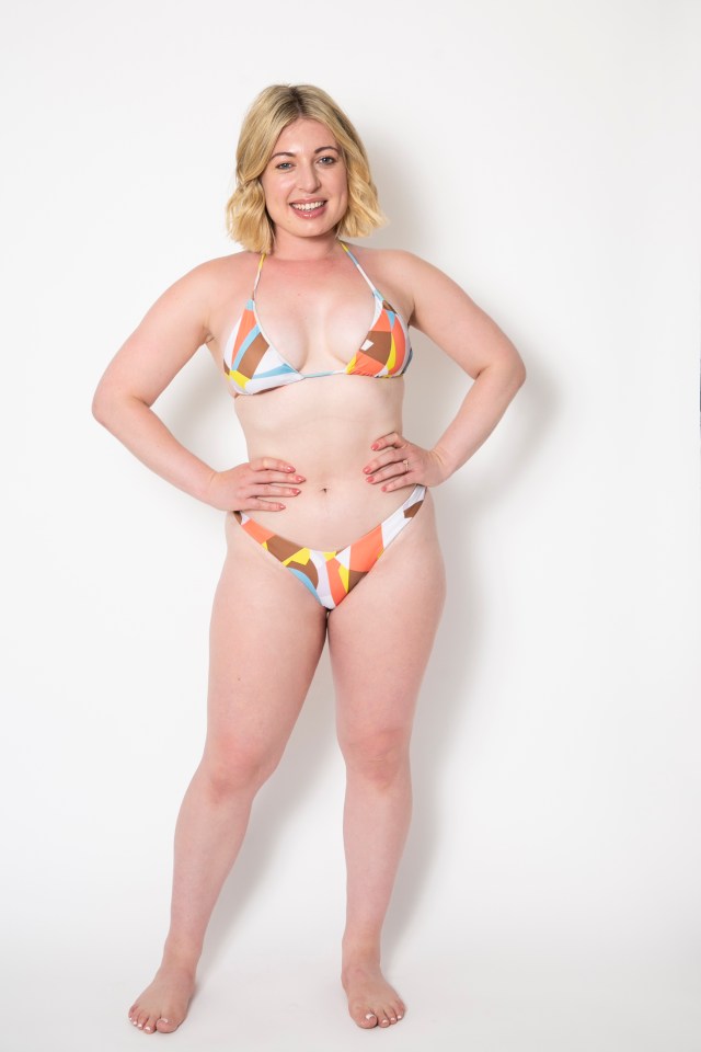 a woman in a bikini stands with her hands on her hips