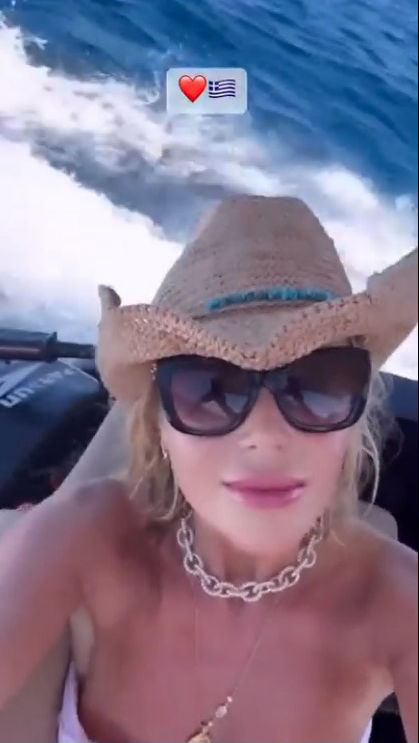 Amanda Holden appeared almost 'topless' in her Instagram Stories as she enjoyed a speedboat ride in Corfu.