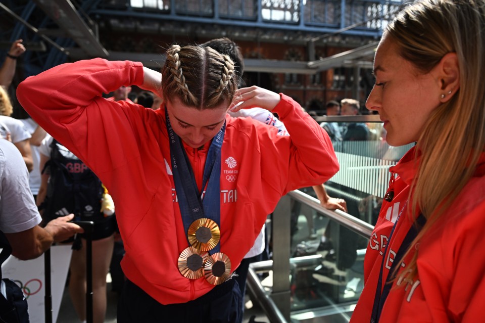 Emma Finucane wore all three of her medals after success in the cycling