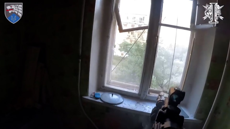 At one point in the footage, a Ukrainian soldier can be seen using a machine gun from inside a building