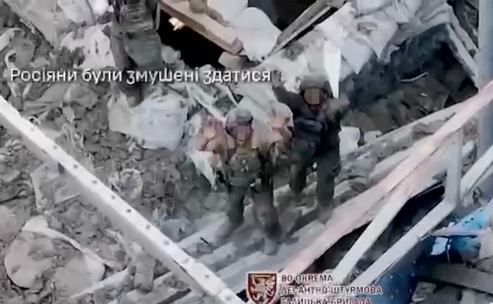 two soldiers are standing in a pile of rubble with the words 80 orpena on the bottom