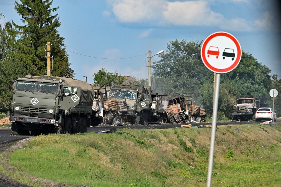 A view of the column of Russian Army trucks damaged by shelling by he Ukrainian Armed Forces on the highway in the Sudzhansky district, Kursk region of Russia, Friday, Aug. 9, 2024. (Anatoliy Zhdanov/Kommersant Publishing House via AP)