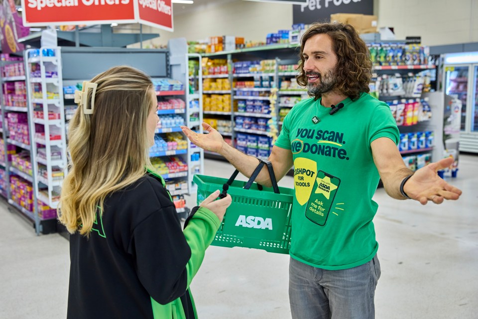 a man wearing a green shirt that says you scan we donate