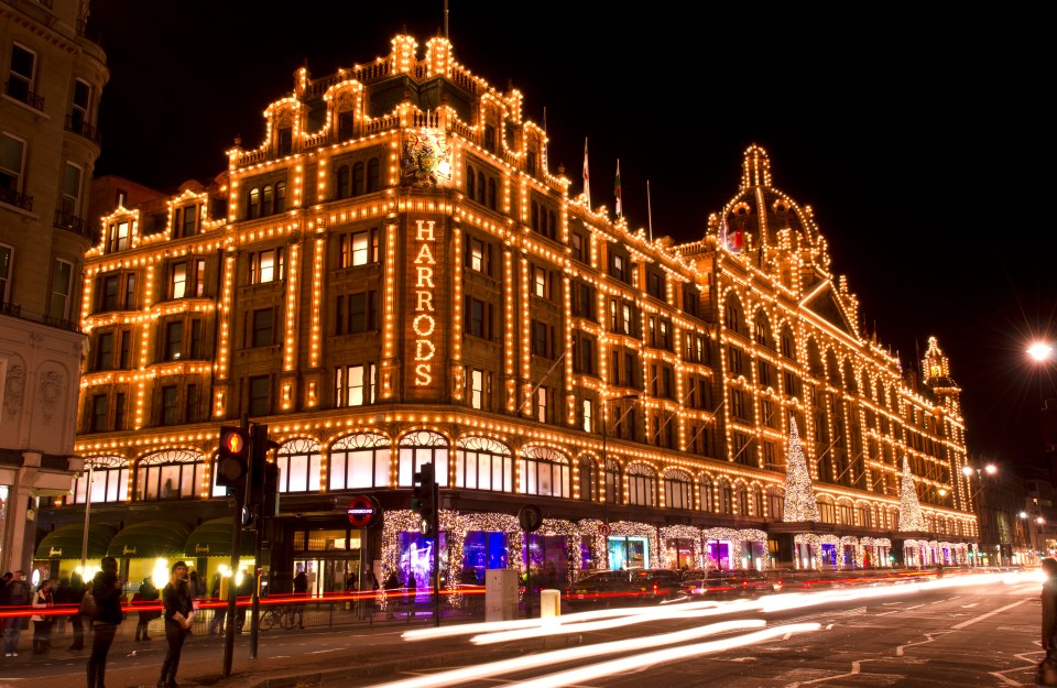 the harrods building is lit up at night