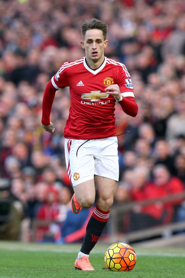 a soccer player in a red jersey with the word chevrolet on it