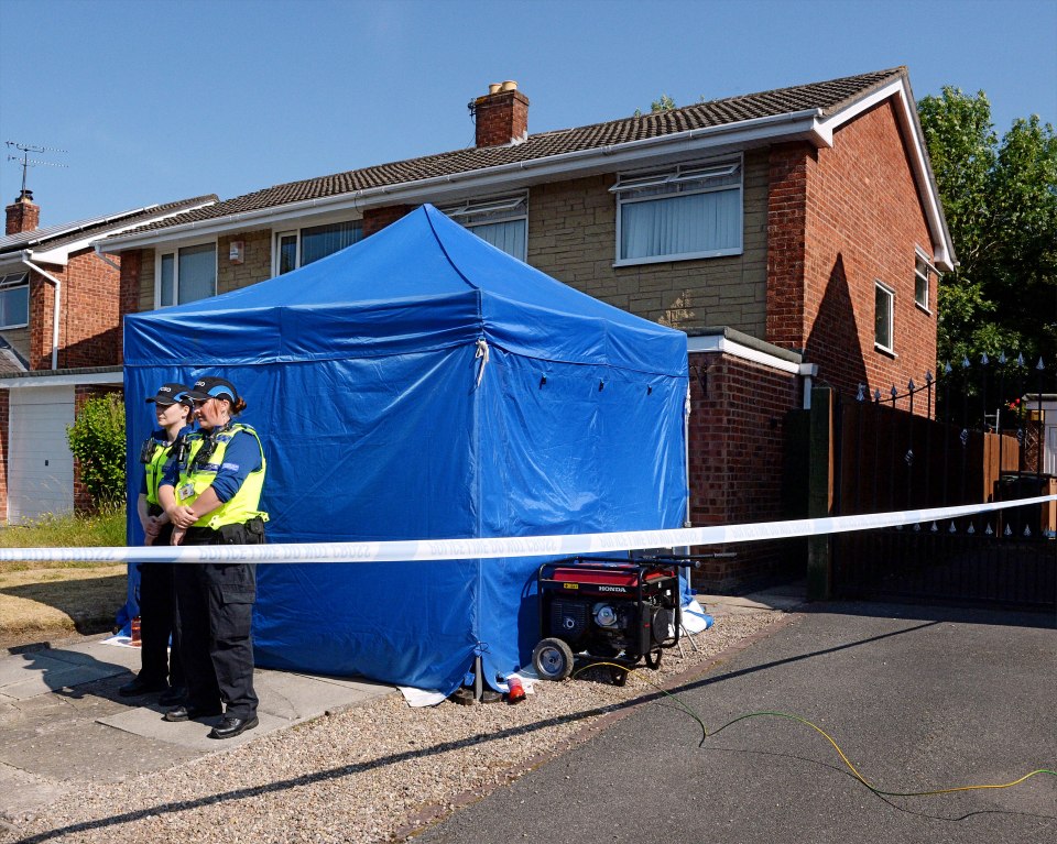 Police outside Letby’s home in Chester after her arrest in 2018