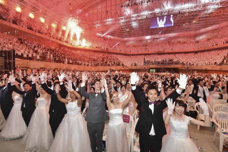 Some 3,500 couples of the world participate in a mass wedding ceremony at the Cheongshim Peace World Center in Gapyeong, South Korea