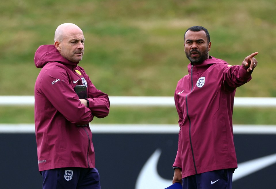 England interim manager Lee Carsley and assistant coach Ashley Cole pictured during training