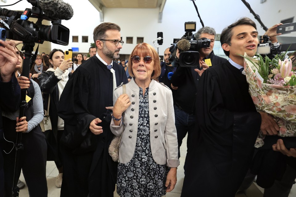 Gisele Pelicot flanked by her lawyers as she exits the criminal court in Avignon