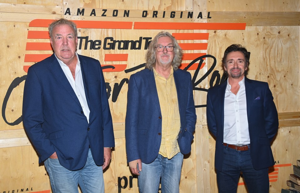 three men stand in front of a sign that says amazon original