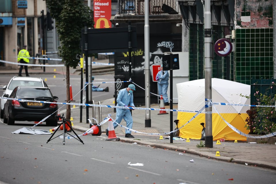 A forensic tent remains in the area