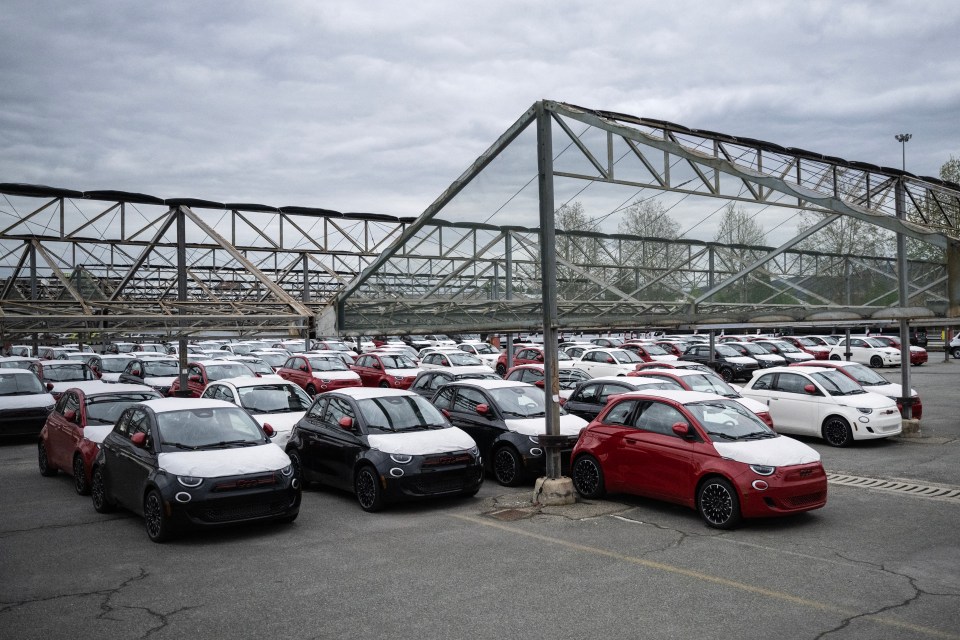 a lot of cars are parked in a parking lot