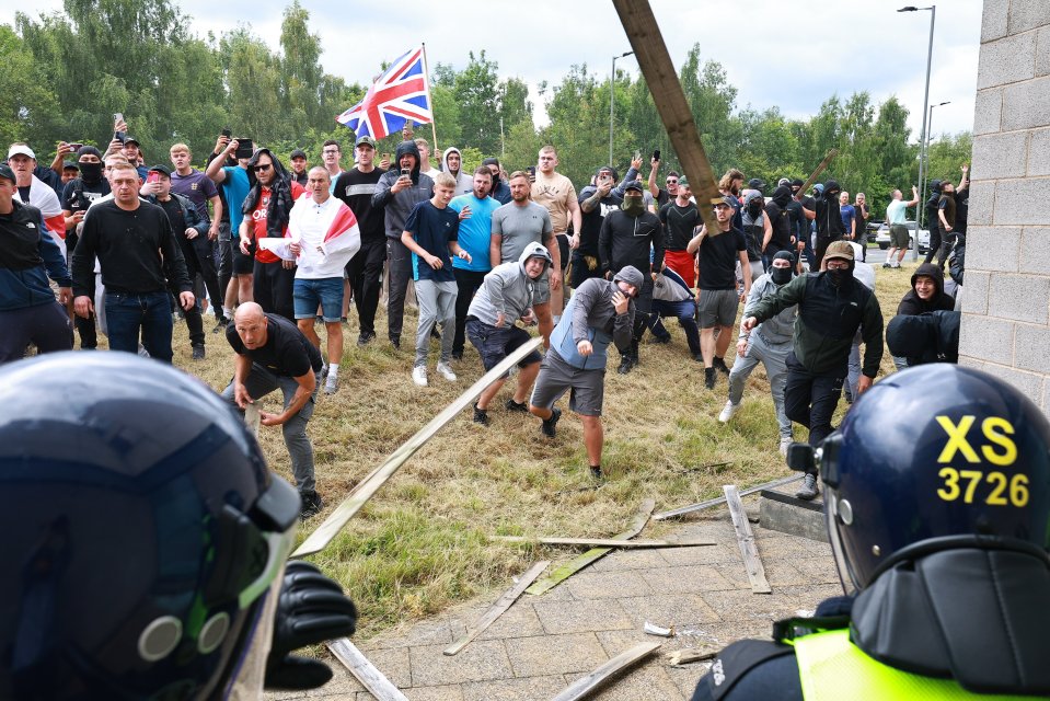 Police surround a hotel in Rotherham after far right protesters started shouting “get them out”